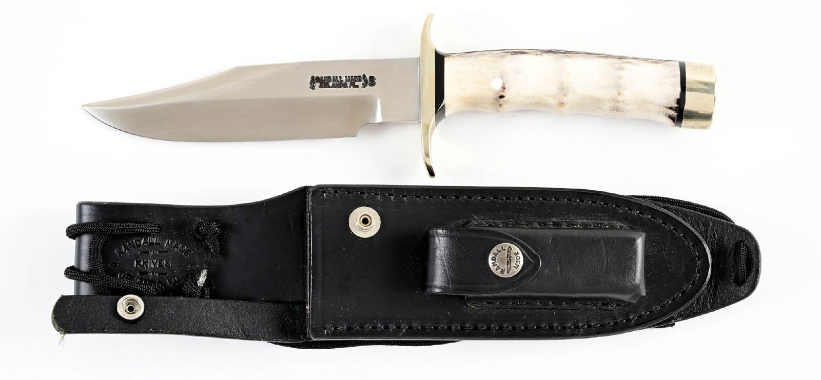 RANDALL MODEL 15 AIRMAN.: Randall Model 15 Airman with a clip point blade marked "RANDALL MADE / ORLANDO, FLA." between Randall's signature scimitars with separate "S" denoting stainless steel construction. Blade exhibits visi