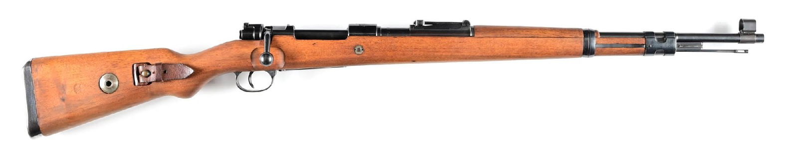 (C) EXCEPTIONAL PORTUGUESE CONTRACT MAUSER K98 BOLT ACTION RIFLE (1941).: 1941 dated receiver crest. Blue finished with German "WaA135 / waffenamt". Hooded front sight with slotted stock for German pattern leather sling. All matching serial numbers. CONDITION: Exceptionally