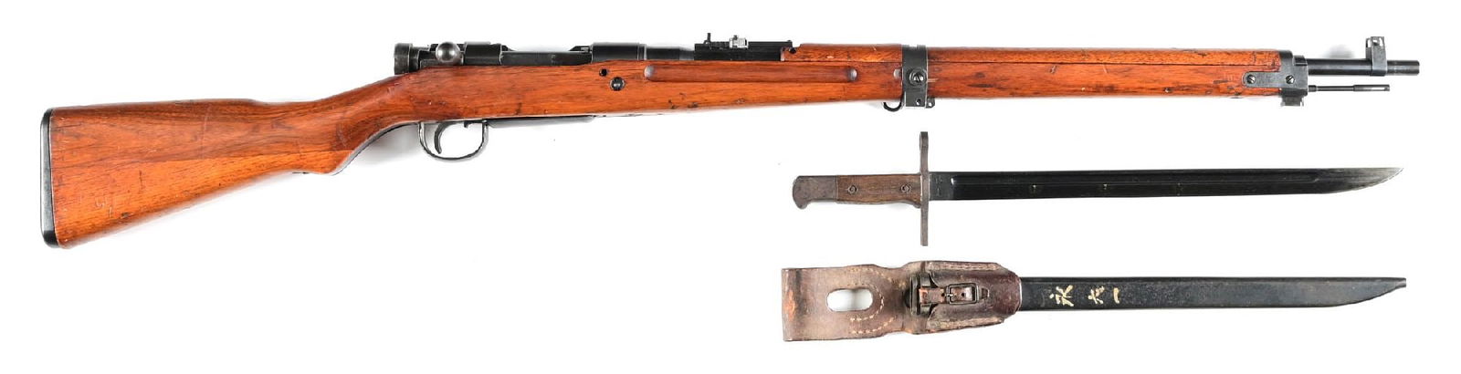 (C) KOKURA TYPE 99 ARISAKA BOLT ACTION RIFLE.: Produced at Kokura Arsenal with blue finish and Chrysanthemum on receiver ring. Varnished wood stocks. Folding rear military sight and chrome lined bore. Rifle is accompanied by correct Kokura marked