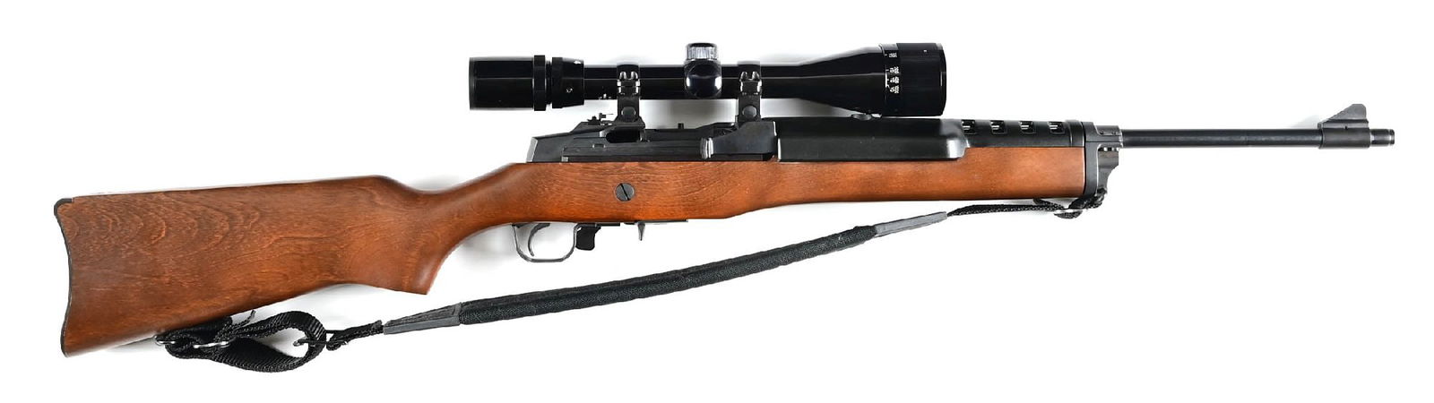 (M) RUGER MINI-14 RANCH RIFLE .223 SEMI-AUTOMATIC RIFLE.: Circa 2000 per serial number. Fixed blade front sight, adjustable aperture rear sight, fit with a Bushnell 4-12x40 Sportview scope with duplex reticle. Vented polymer upper handguard with a one piece