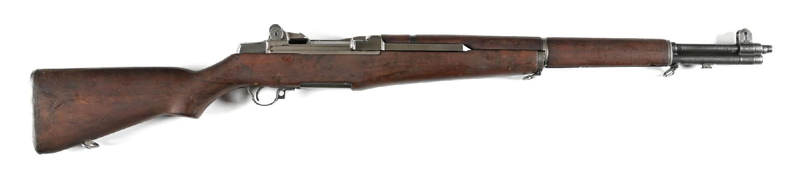 (C) U.S. SPRINGFIELD M1 GARAND SEMI-AUTOMATIC RIFLE.: Circa July 1943. Springfield barrel dated "1-52". Post-War sights. Rebuilt internals. Standard walnut stocks. CONDITION: Good as arsenal reworked. Good bore. ME 1.5 TE 3. Barrel Length: 24" Caliber/Bo