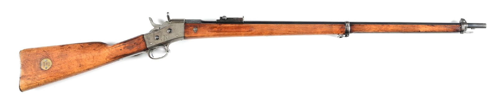 (A) SWEDISH REMINGTON M1867 ROLLING BLOCK RIFLE.: Case colored receiver with bright finished rolling breech and hammer. Rust blue finished barrel with varnished wood stocks. Regimental ID disk in butt (17R.3K.No96.) CONDITION: Very fine with excellen