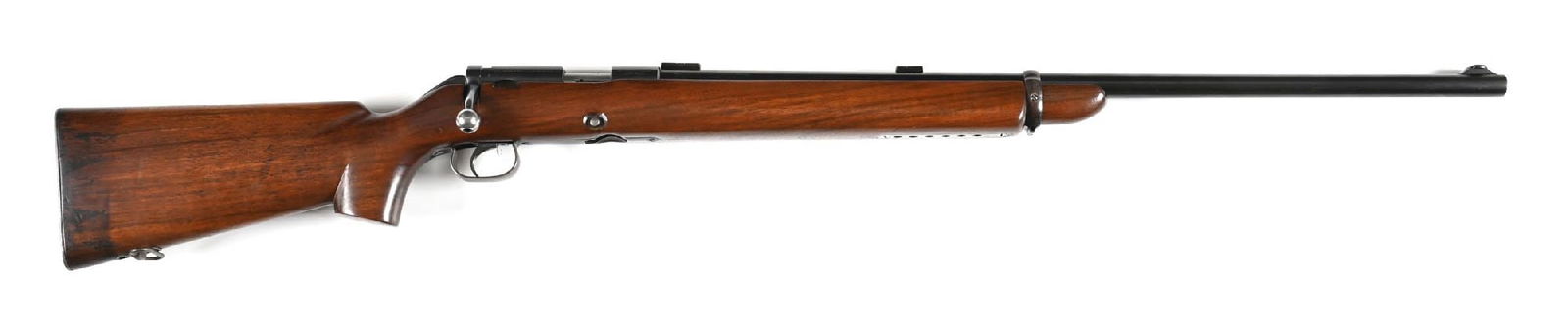 (C) PRE-WAR WINCHESTER MODEL 52B BOLT ACTION TARGET RIFLE (1937).: Dates to 1937. Standard in all respects but excepting a Miller custom trigger. Features the medium weight blued barrel with front sight base that has a blade filler, no receiver sight as slot is empty