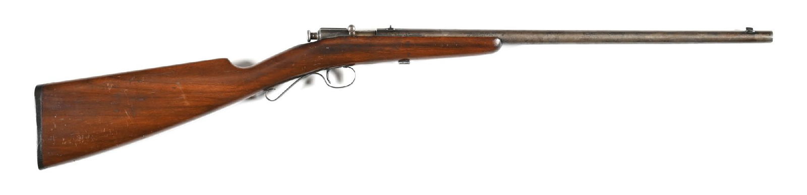 (C) WINCHESTER MODEL 1902 BOLT ACTION SINGLE SHOT .22 RIFLE.: Features include the blue finish, dovetailed front sight, wind drift rear leaf sight, take down, and walnut stock with a Winchester black butt plate. CONDITION: Very good. The barrel shows some flashe