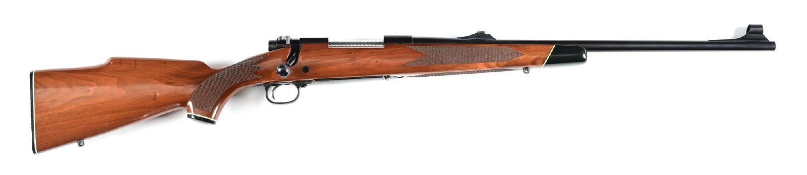 (M) WINCHESTER MODEL 70 .30-06 SPRINGFIELD BOLT ACTION RIFLE WITH BOX.: Dates to 1978. This deluxe rifle features the blue finish, hooded ramp front sight, adjustable rear sight, high gloss checkered walnut stock, pistol grip with cap, Monte Carlo comb, black forearm tip,