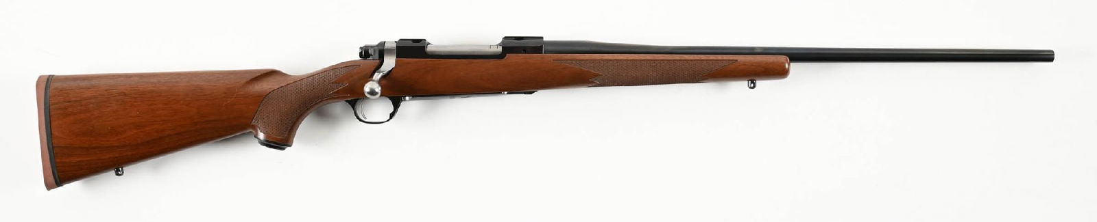 (M) RUGER M77 HAWKEYE .270 WINCHESTER BOLT ACTION RIFLE WITH BOX.: Features a hand checkered oil finished walnut stock with pistol grip, solid red recoil pad, sling eyes, and blue finish. No provisions for sights, but does come with a set of rings. It includes the ma
