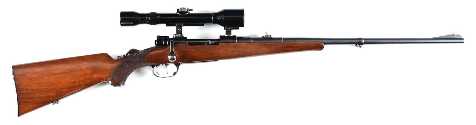 (C) PRE-WAR FACTORY MAUSER BOLT ACTION SPORTING RIFLE IN 8X60MM.: This big bore hunting cartridge was designed for the Mauser 98K action soon after the first World War to circumvent the Treaty of Versailles restrictions. The receiver sports the Mauser Oberndorf lege