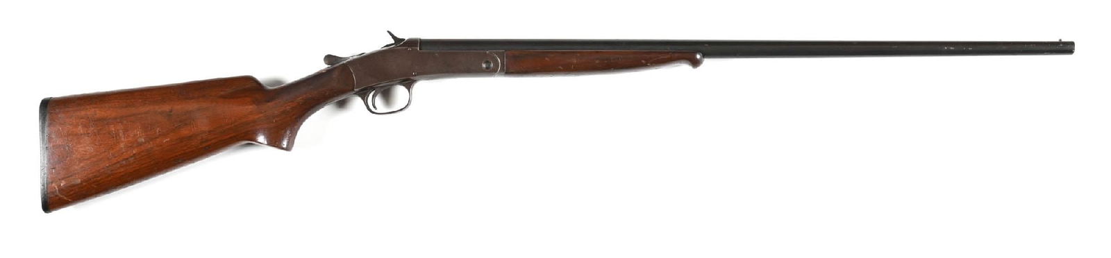 (C) PRE-WAR WINCHESTER MODEL 20 SINGLE SHOT .410 SHOTGUN.: Blued barrel with single bead front sight, blue frame, plain walnut stock with pistol grip, black Winchester butt plate, and a matching Schnabel forearm. CONDITION: Very good to fine. The barrel retai