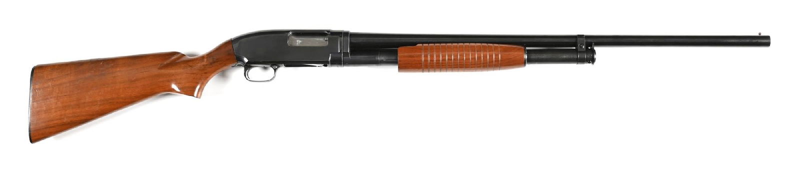 (C) PRE-64 WINCHESTER MODEL 12 SLIDE ACTION 12 GAUGE SHOTGUN.: Dates to 1963. Standard field grade with blue finish, take down, single bead front sight, plain walnut stock with pistol grip, black Winchester buttplate, and round grooved forearm. CONDITION: Excelle