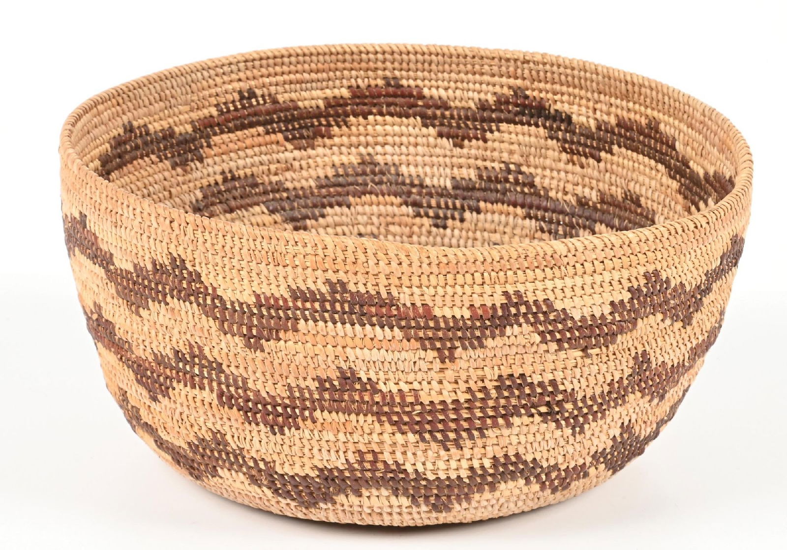 YOKUTS BASKET: Overall gap stitch construction. Excellent condition. Dimensions: 7" Dia. x 4 - 1/2".