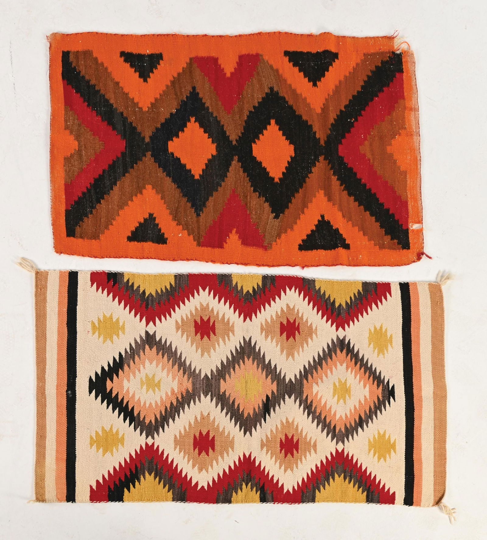LOT OF 2: NAVAJO (DINÉ) RUGS: Both contemporary. (A) Areas of warp showing, two areas of substantial loss, A and B sides. 56" x 30". (B) Slight staining, corner curls, and some moth damage. 51" x 32". Dimensions: Largest: 56" x