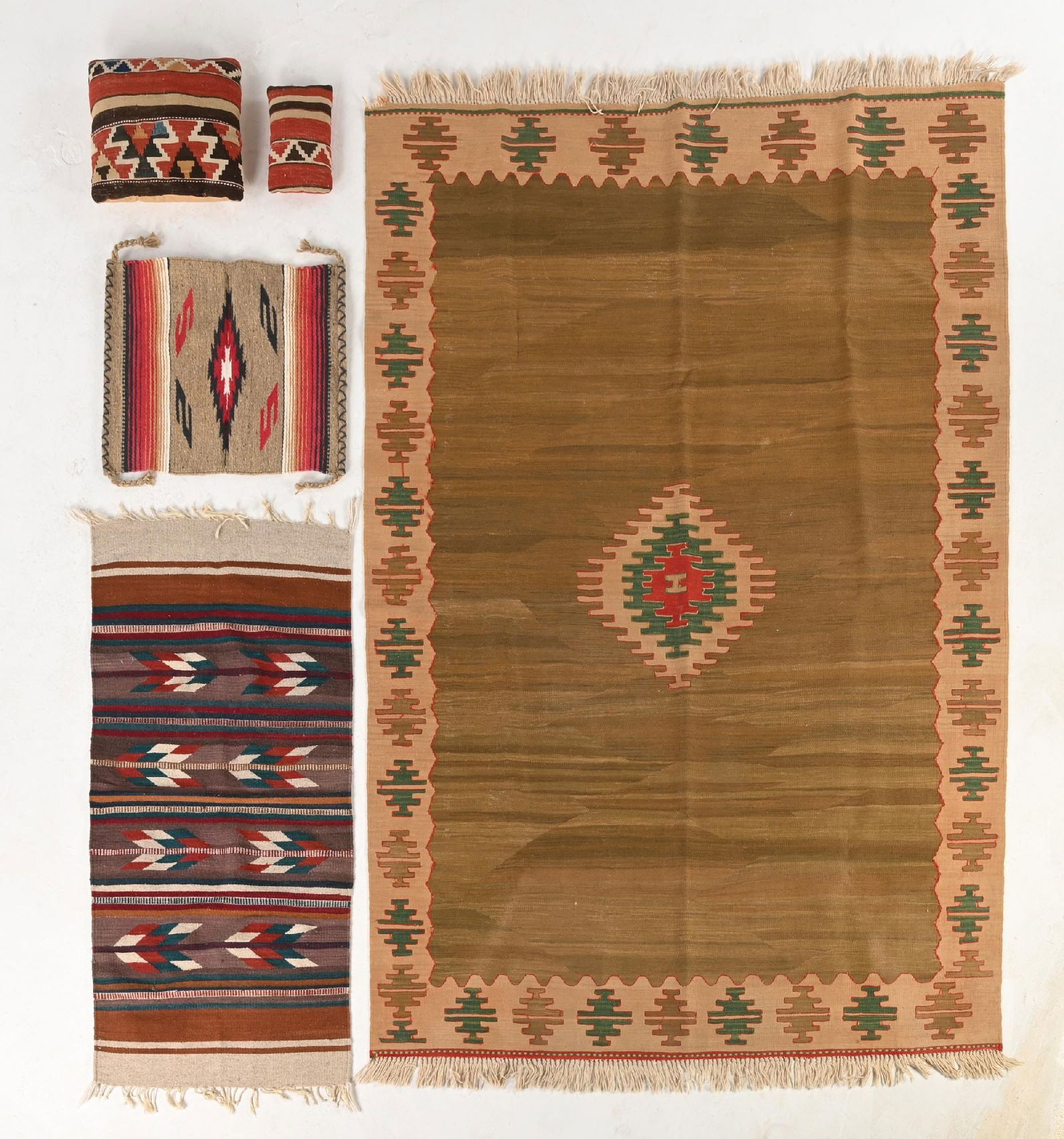 LOT OF 5: SOUTHWEST-STYLE WEAVINGS: All contemporary. (A) Needs cleaning. 101" x 69". (B) Good condition. 57" x 28-1/2". (C) Good condition. 27" x 21". (D) Kilm Pillow. Some staining. 16" x 13". (E) Small Kilm Pillow. Good condition.