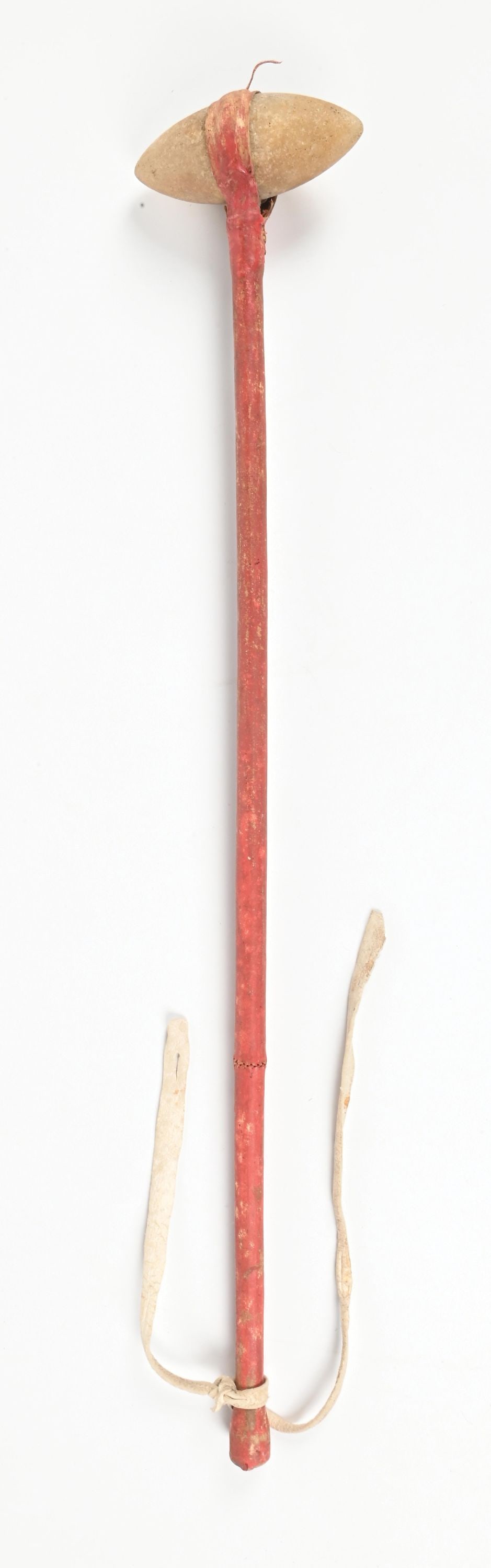 PLAINS CLUB: Contemporary replica. With pointed quartz head. Rawhide handle stained red. Dimensions: 6" x 33".