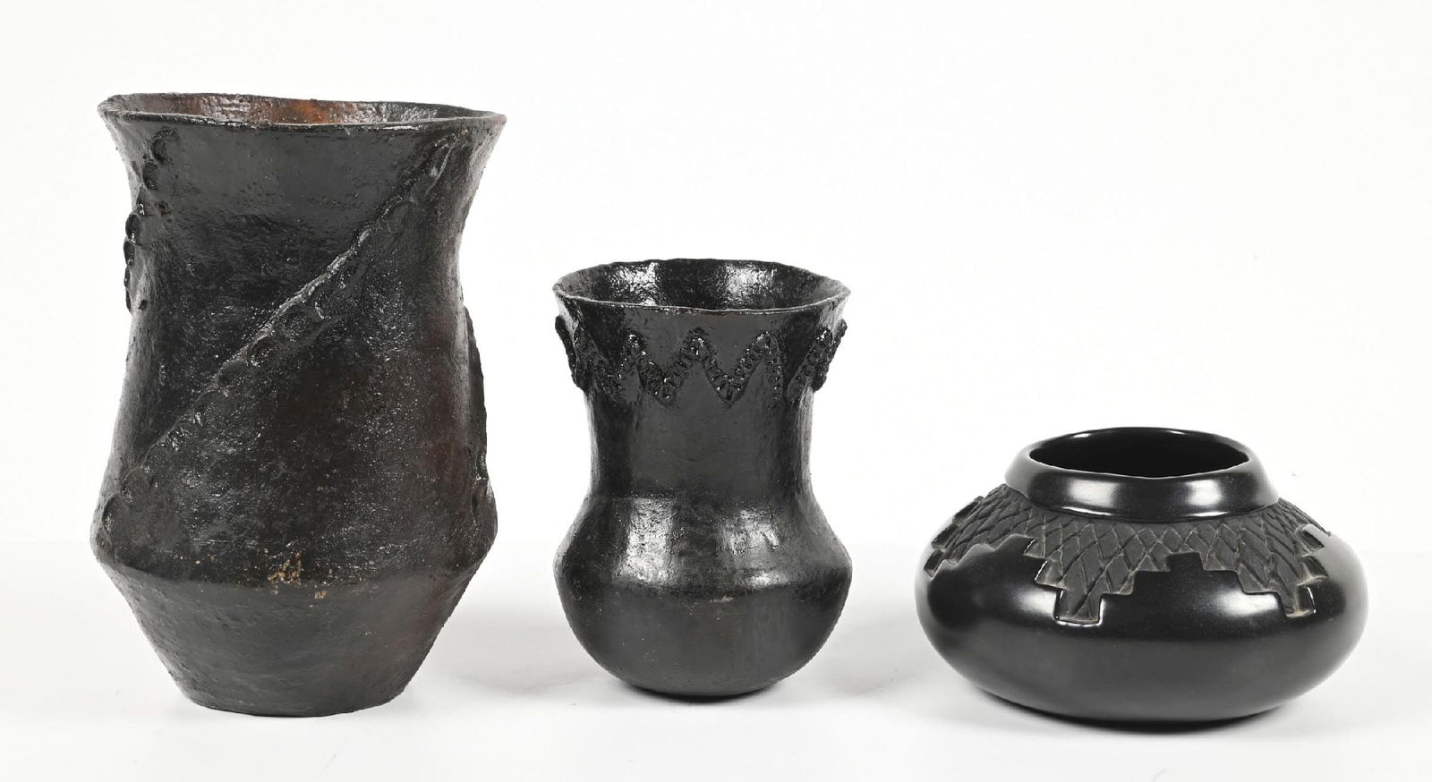 LOT OF 3: NAVAJO (DINÉ) JARS & PLAINS OLLA: One signed "HB". Provenance: Estate of N. Harman. Dimensions: Largest: 3 - 1/2" D. x 9 - 1/4" T.