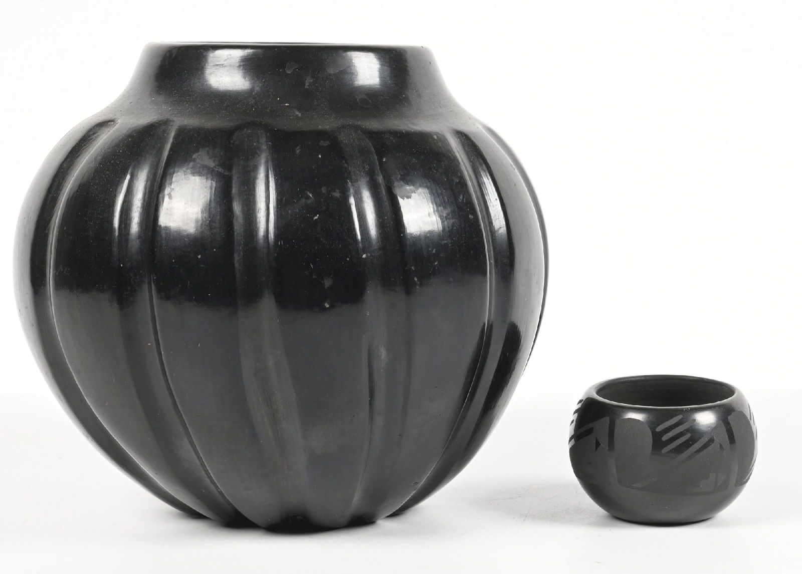 LOT OF 2: SANTA CLARA POTTERY ITEMS: One signed "John". Provenance: Estate of N. Harman. Dimensions: Largest: 3 - 1/2" D. x 7 - 1/2" T.