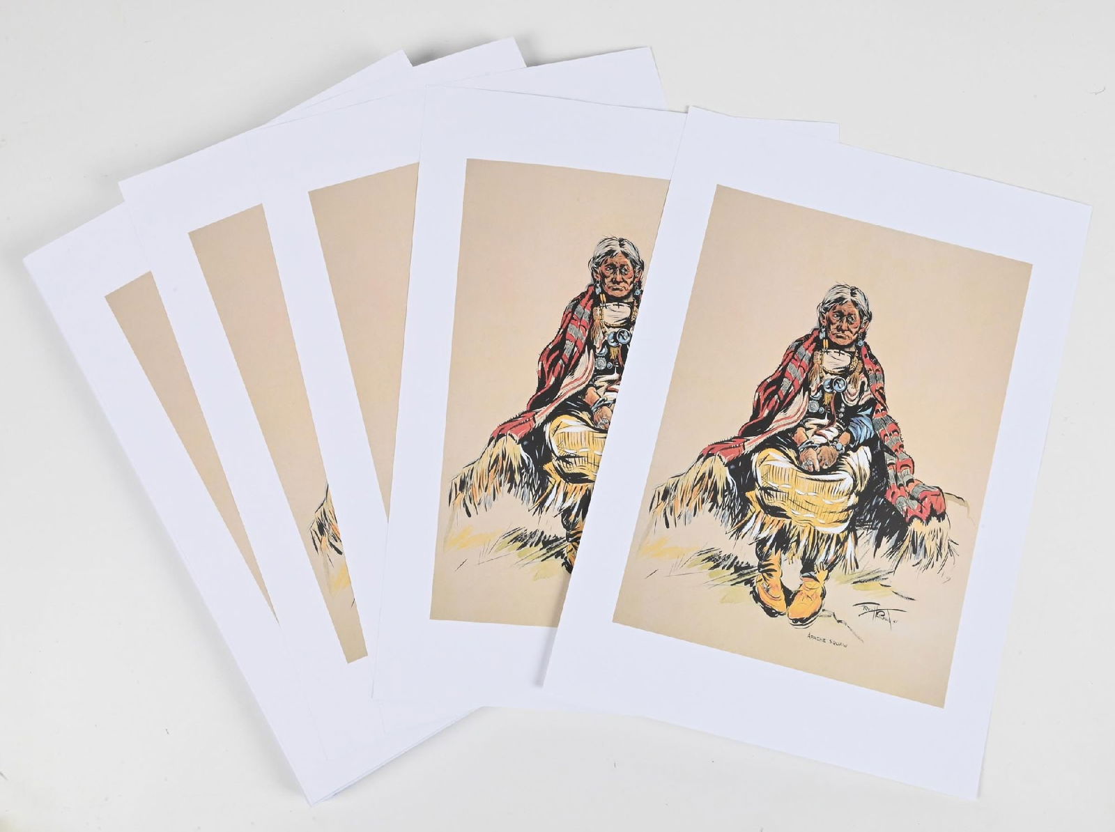 LOT OF APPROXIMATELY 100 “APACHE SQUAW” BY FRED HARMAN PRINTS: Provenance: Estate of N. Harman. Dimensions: Each: 20" x 14".