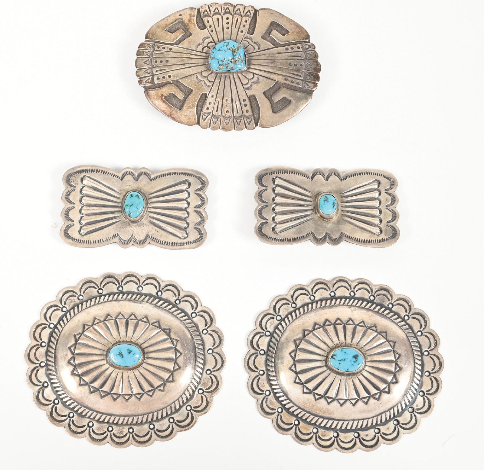 LOT OF 5: STERLING SILVER & TURQUOISE BELT BUCKLES: One large buckle and 4 vintage sterling silver and turquoise pieces removed from a Navajo concho belt. Dimensions: Largest: 3 - 1/2" x 3".