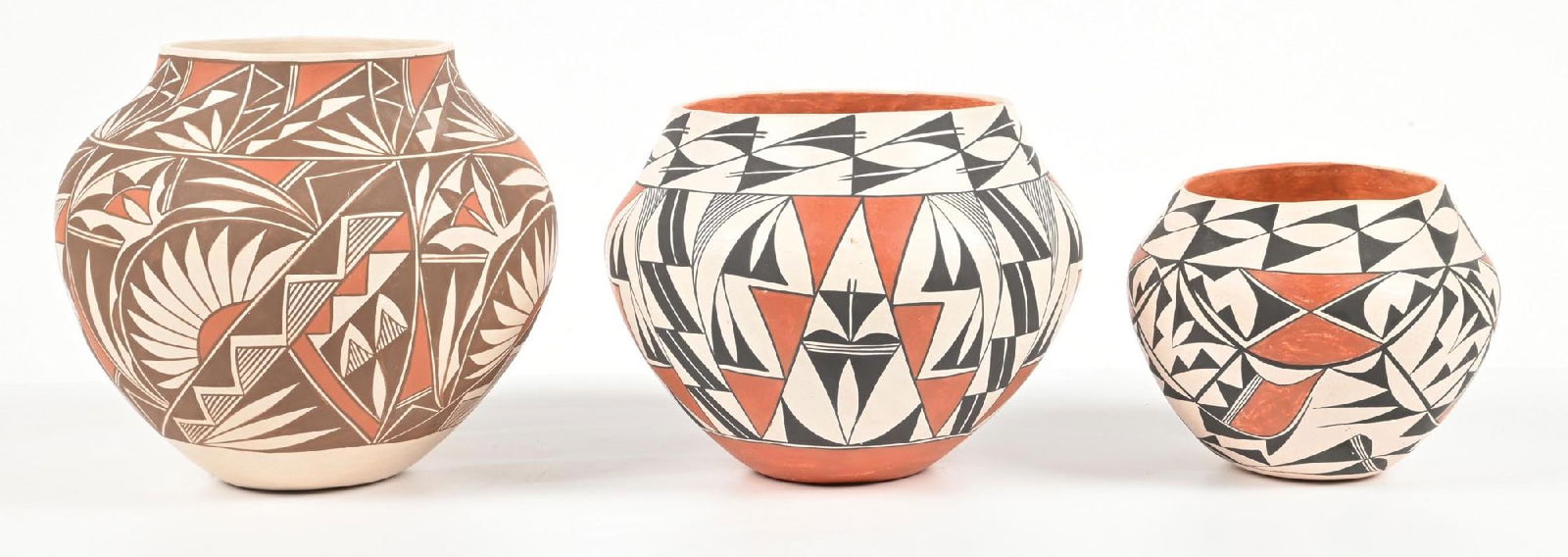 LOT OF 3: ACOMA (ÁAK’U) & LAGUNA POTTERY OLLAS: (A) 9" dia. x 8-1/4" t. (B) 8-1/2" dia. x 7-1/2" t. (C) 6-1/2" dia. x 5-1/2" t. All are good condition. Dimensions: Largest: 9" Dia. x 8 1/4" T.