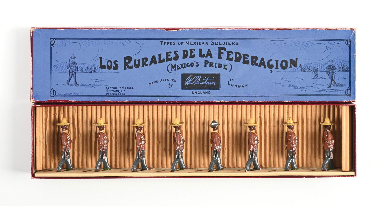 W. BRITAIN TYPES OF MEXICAN SOLDIERS LOS RURALES DE LA FEDERACION NO. 186 SET IN BOX: Pre-war. With officer. Paint wear to sombreros and rifle stocks, excellent box. 8 pieces. Dimensions: Box: 14 - 3/4" x 3 - 1/2" x 1 - 1/4".