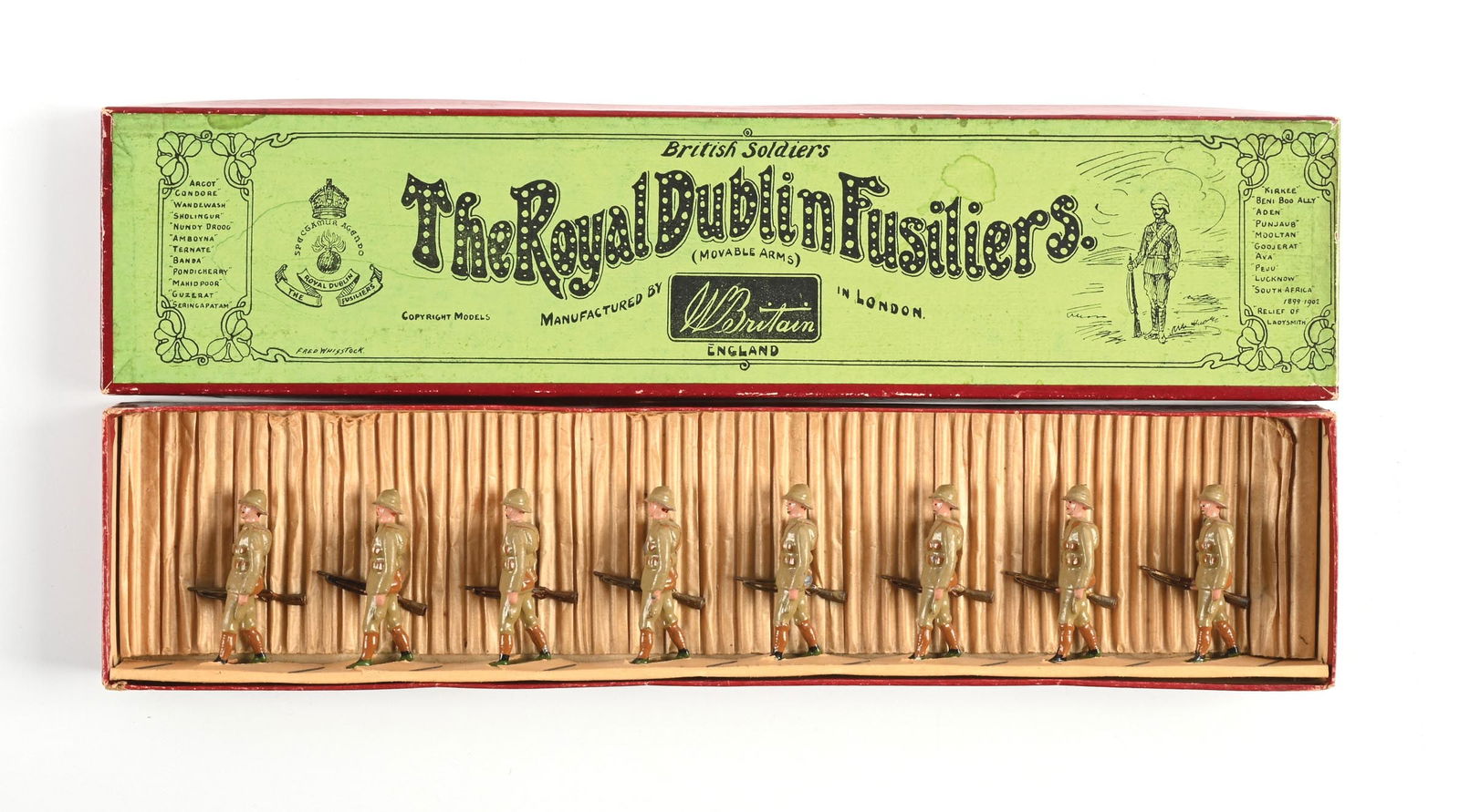 W. BRITAIN THE ROYAL DUBLIN FUSILIERS SET NO. 109 IN BOX: Marching at the trail, Wolseley helmet version. Excellent condition. 8 pieces. Dimensions: Box: 14 - 3/4" x 3 - 1/2" x 1 - 1/4".