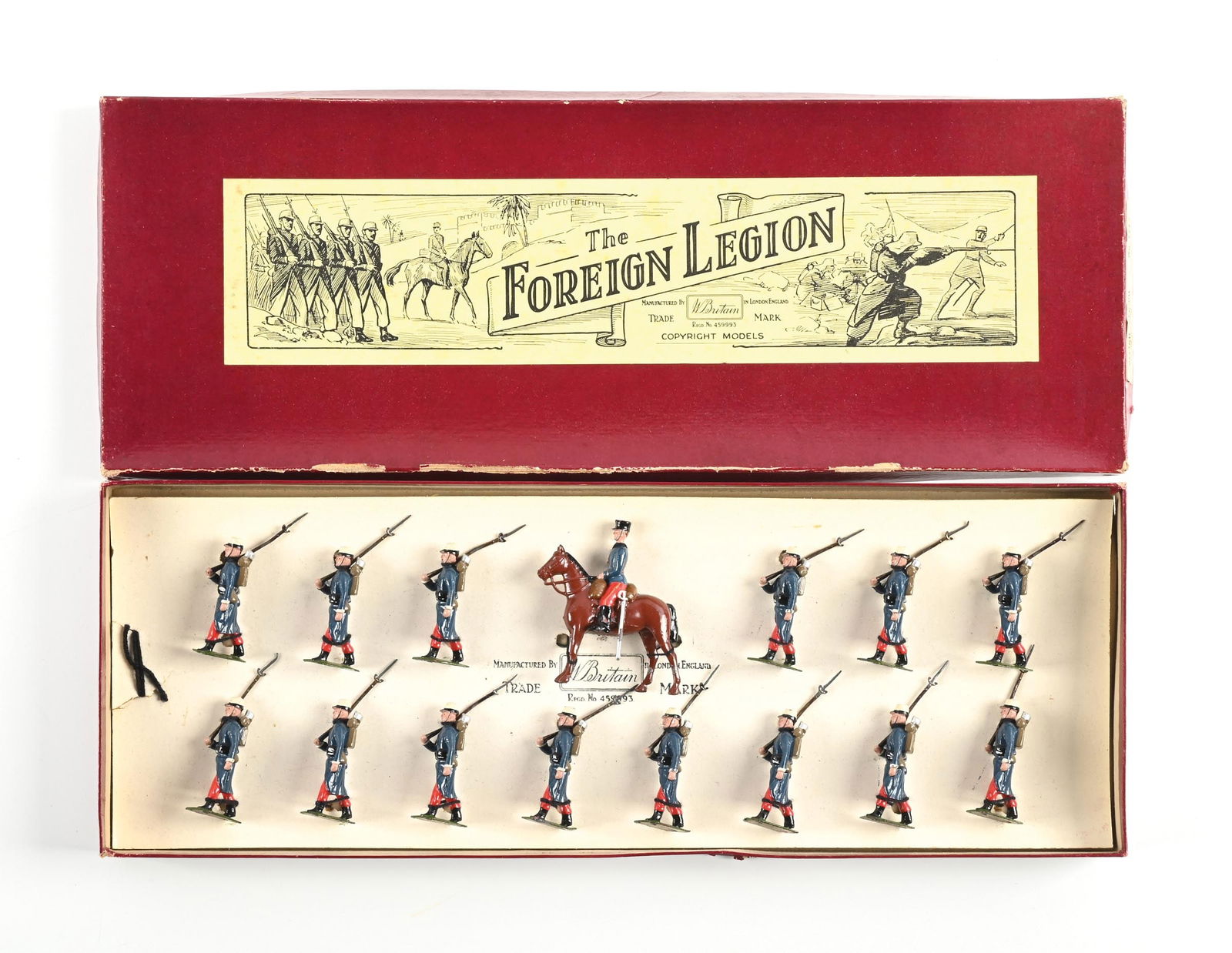 W. BRITAIN THE FRENCH FOREIGN LEGION DISPLAY SET NO. 1712 IN BOX: Pre-war. With mounted officer. One bottom of bayonet broken off, re-tied in box. 15 pieces. Dimensions: Box: 18 - 1/4" x 6 - 1/2" x 1 - 1/4".