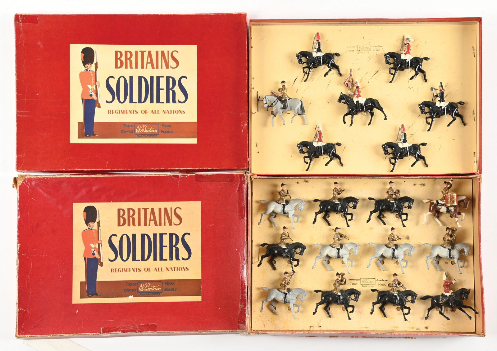 LOT OF 2: W. BRITAIN THE SOVEREIGN'S STANDARD WITH TRUMPETER AND ESCORT NO. 2067, AND GUARDS NO. (1 of 2)