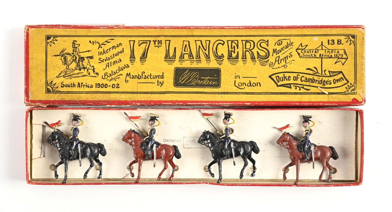 W. BRITAIN DUKE OF CAMBRIDGE'S OWN 17TH LANCERS SET NO. 13B IN BOX: Paint wear. Original box and tie card. Very good condition. 4 pieces. Dimensions: Box: 12 - 3/4" x 3" x 1".