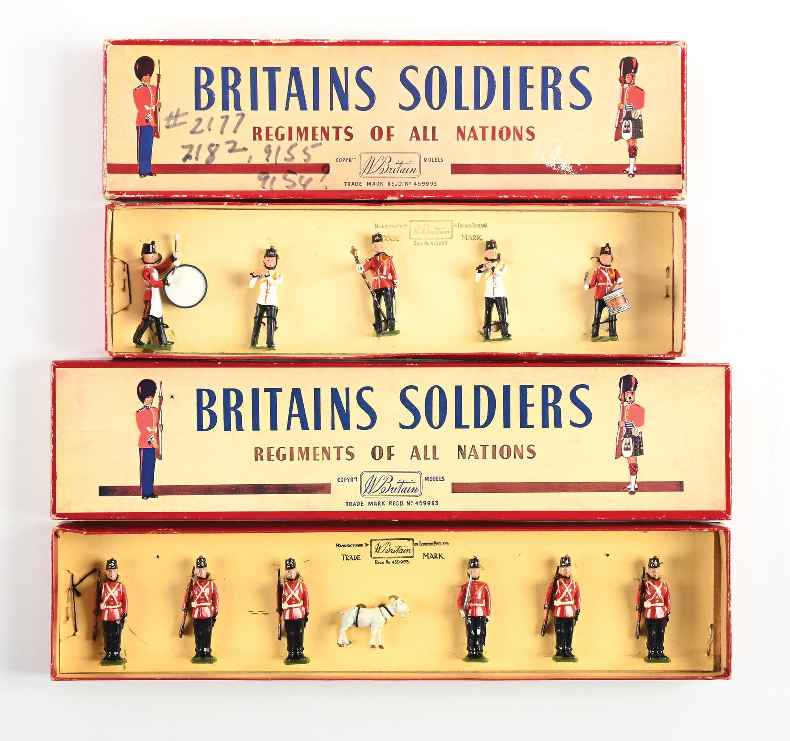 LOT OF 2: W. BRITAIN SETS IN BOXES: (A) Fort Henry Guard No. 2148, at attention, with officer and mascot. Excellent condition. 7 pieces. (B) Fort Henry Guard Band Fifes & Drums No. 2177, with drum major, plastic drum. Excellent