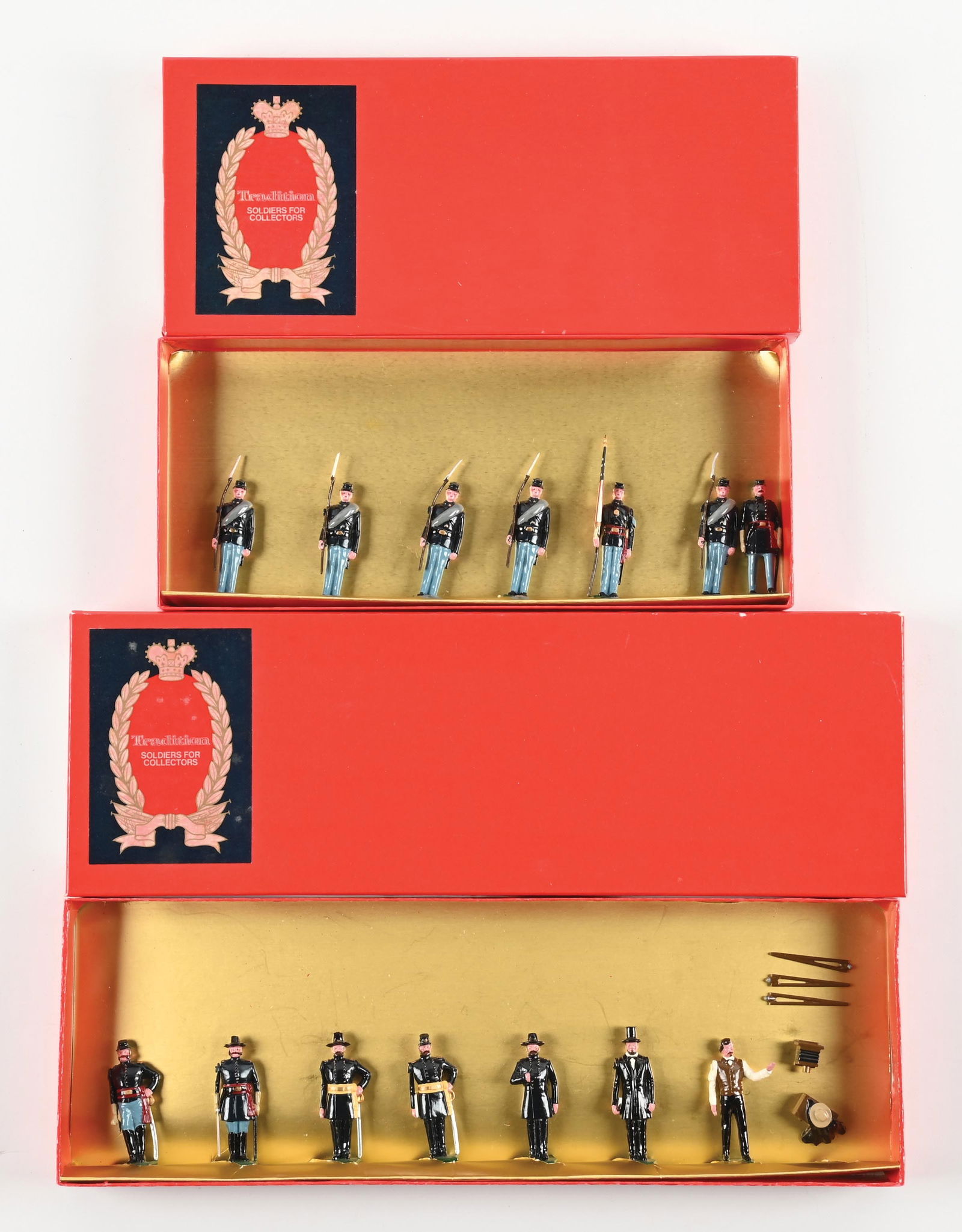 LOT OF 2: TRADITIONS SERIES UNION INFANTRY & PRESIDENT LINCOLN AND HIS GENERALS SETS IN BOXES: (A) Union Infantry No. 17 at attention, with officer and standard bearer. Very good condition. 7 pieces. (B) President Lincoln & His Generals with Matthew Brady, the photographer. 8 pieces. 15 pieces