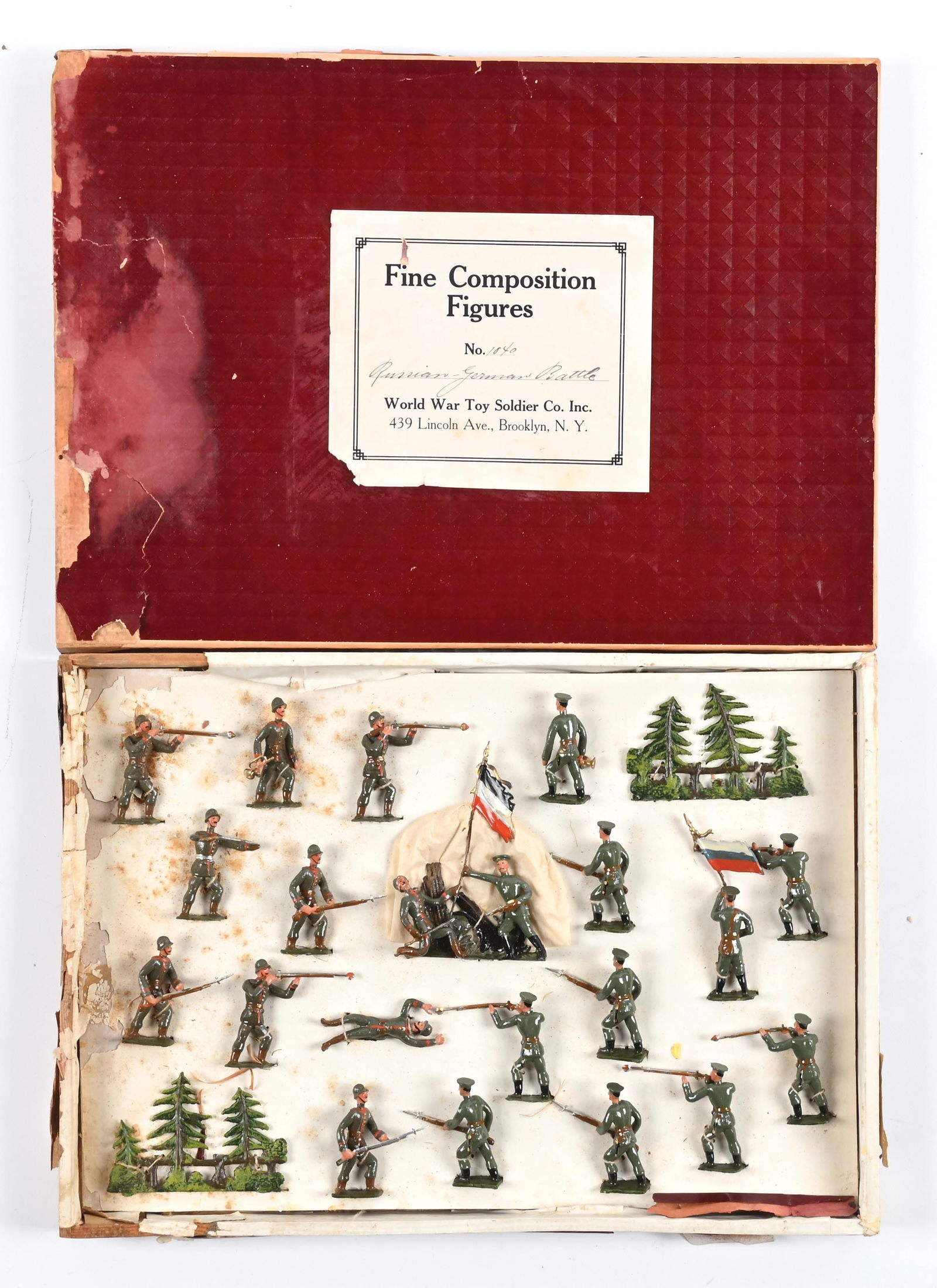 WORLD WAR TOY SOLDIER CO. (NY JOBBER TO HEYDE) RUSSIAN GERMAN BATTLE SET NO. 1040: Includes a Russian German duplex. Beautiful, glossy figures. Original, tied in box, water damage to one third of the box lid and bottom. 22 pieces. Dimensions: Box: 14" x 10 - 1/4" x 1".