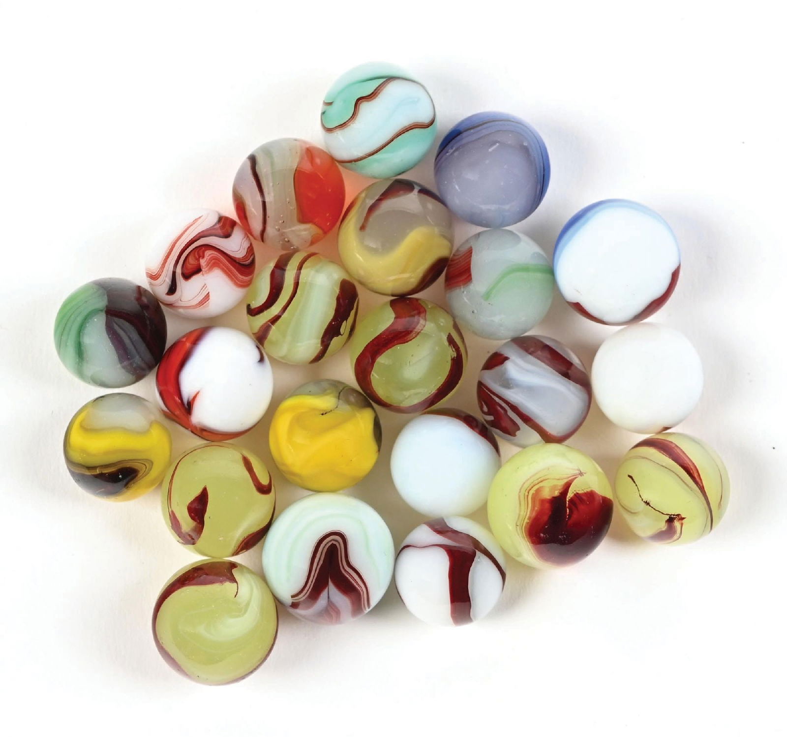 LOT OF 22: AKRO AGATE OXBLOOD MARBLES: 5/8" - 11/16" diam. Lot includes white Oxbloods, Patches Oxbloods, Lemonade Oxbloods, Egg Yolk Oxbloods, and one blue Oxblood. Condition: (9.0). Dimensions: