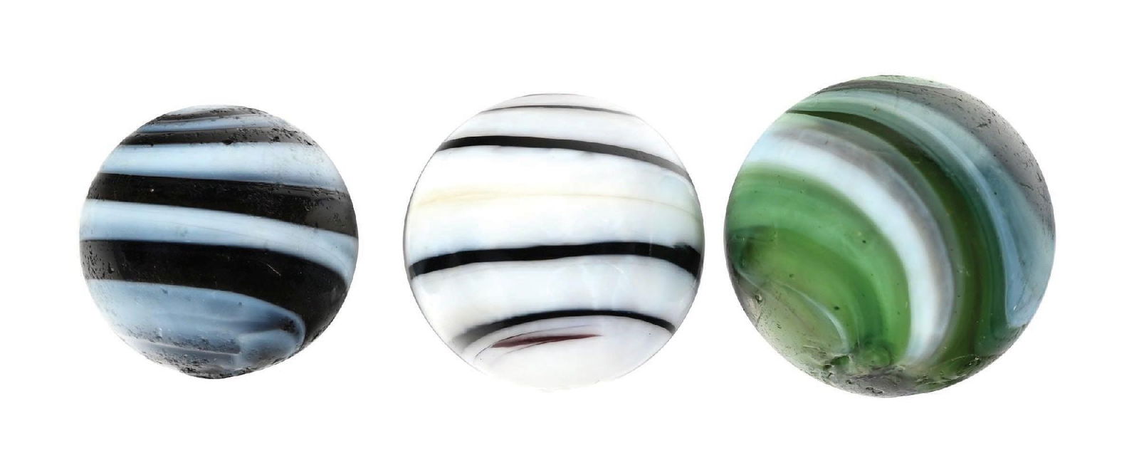 LOT OF 3: NAVARRE HORIZONTAL SWIRLS: 3/4" - 7/8" diam. (A) Smallest is a very nice purple and white horizontal. (B) Purple and white horizontal swirl. (C) Green and white horizontal swirl. This marble has an as-made small blowout hole