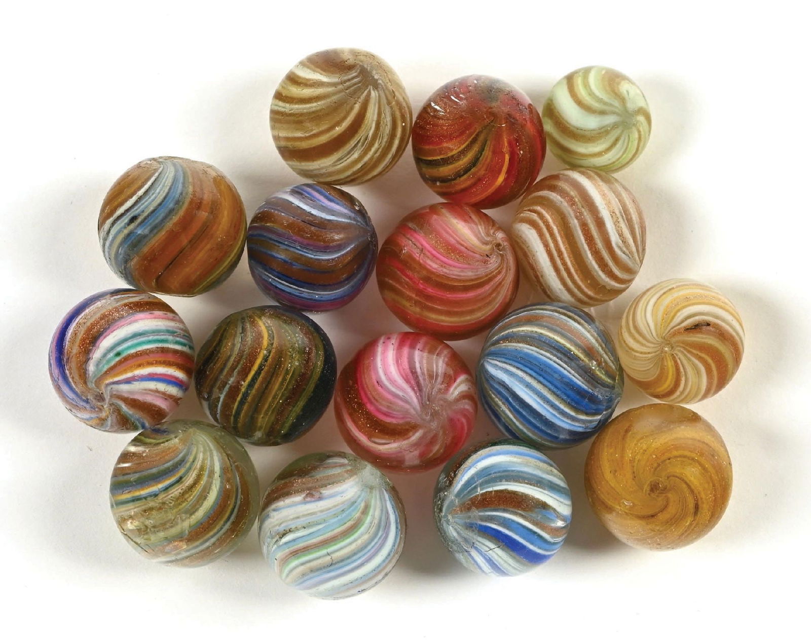 LOT OF 16: ONIONSKIN LUTZ SWIRLED MARBLES: Nice group of onionskin lutz marbles. Ranging in size from 1/2" to 3/4". All in 9.0+ condition. Condition: Dimensions: