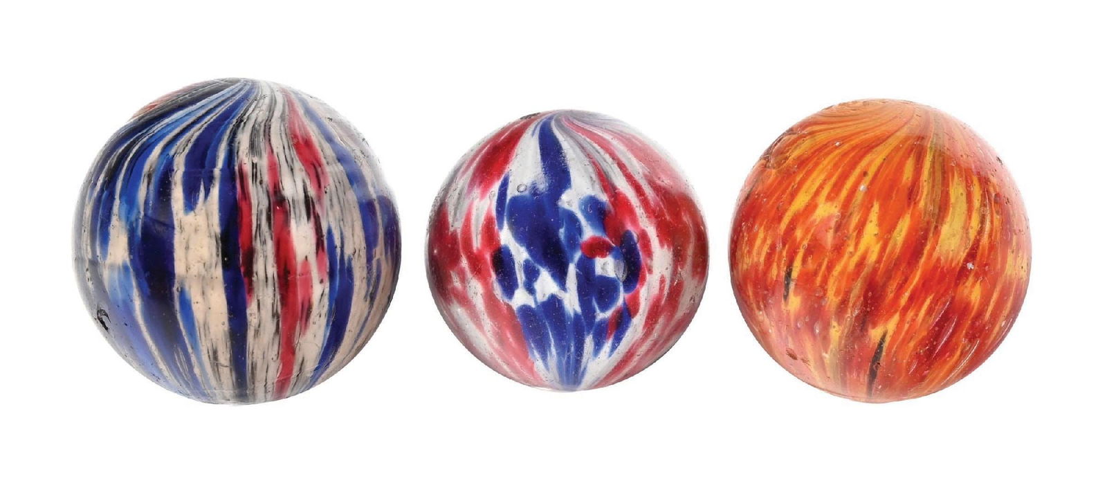 LOT OF 3: ONIONSKIN MARBLES: 1-15/32" - 1-11/16" diam. (A) Four panel onionskin with opposing panels of blue and white and opposing panels of red and white. This marble shows several small chips. (B) Yellow base with orange and s