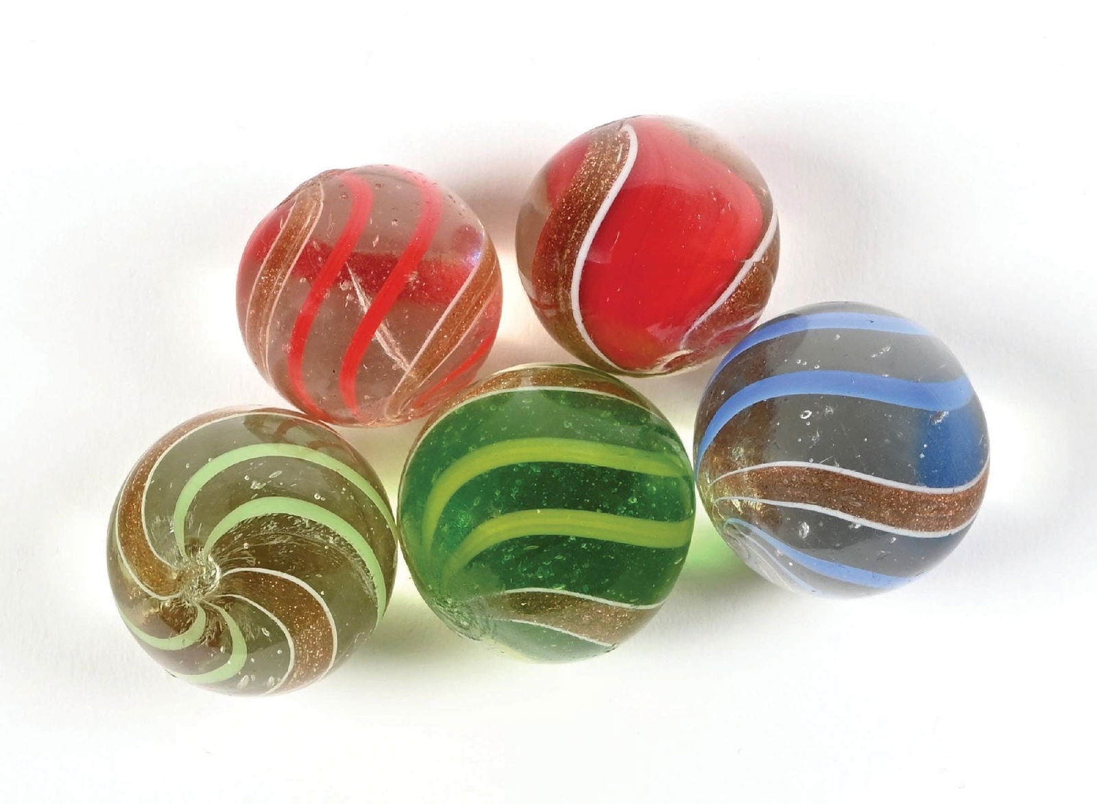 LOT OF 5: LUTZ MARBLES: 51/64" - 7/8" diam. Lot includes an all-red ribbon lutz, a clear lutz with green bands, one clear lutz with red bands, one clear lutz with blue bands, and one green glass lutz with yellow bands.