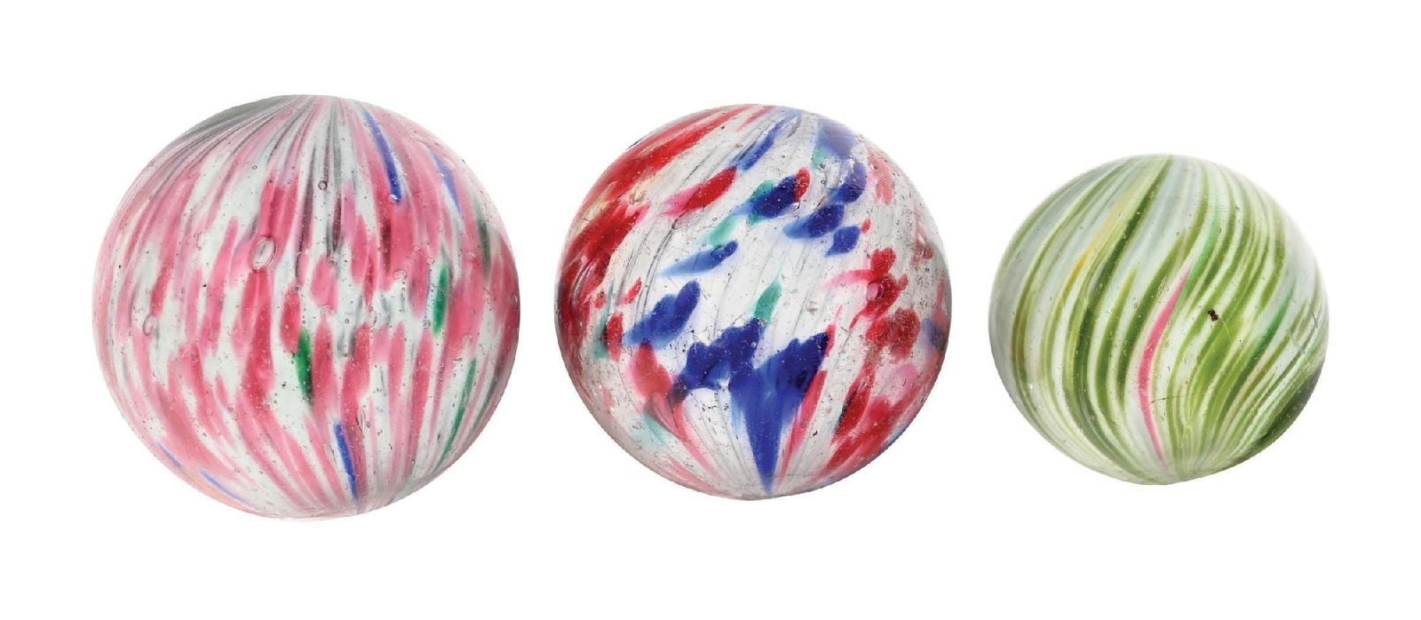 LOT OF 3: ONIONSKIN MARBLES: 1-5/16" - 1-41/64" diam. (A) The smallest is a white base with green striping. (B) White base with blue, turquoise, and red spotting. (C) The largest is a white base with green, pink, and blue.