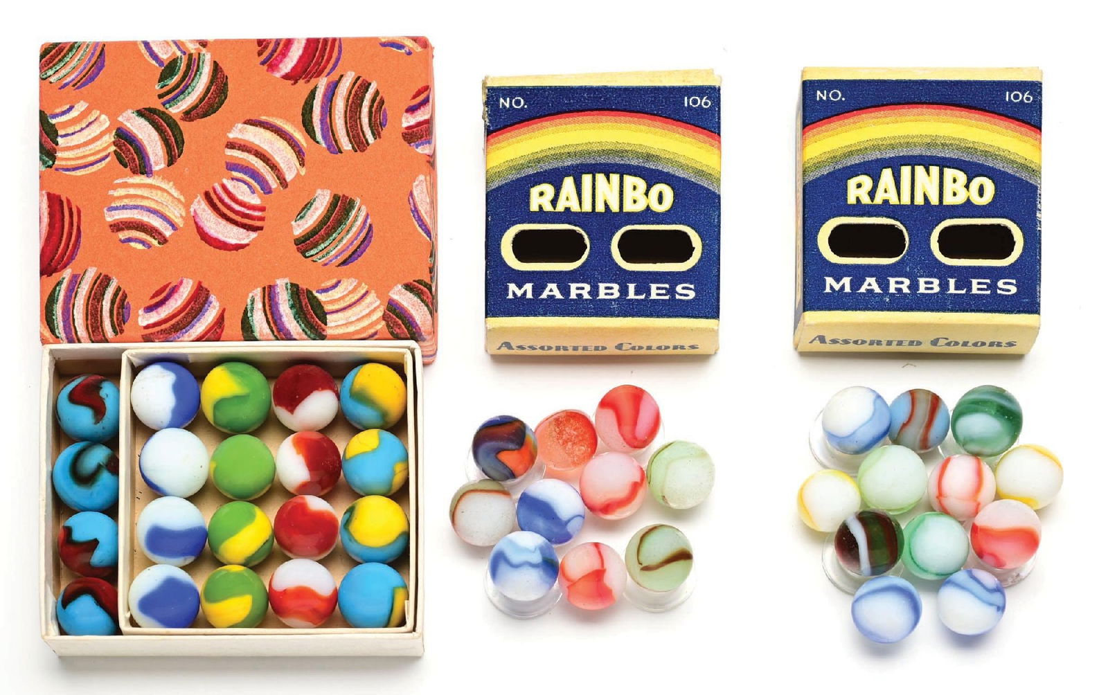 LOT OF 3: PELTIER BOX SETS: 5/8" diam. (A) Orange Dobber box with 20 Peerless Patch. (B) Two No. 106 Rainbo box sets. Marbles: (9.2 Average). Box: (Near Mint). Condition: Dimensions: Largest Box: 3 - 5/8" x 3" x 3/4".