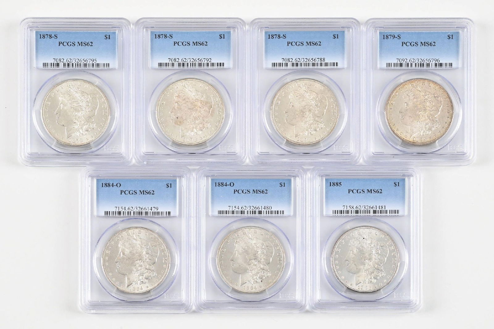 LOT OF 7: 1878-S $1, 1879-S $1, 1884-O $1, 1885 $1 MS62 PCGS: LOT OF 7: 1878-S $1, 1879-S $1, 1884-O $1, 1885 $1 MS62 PCGS