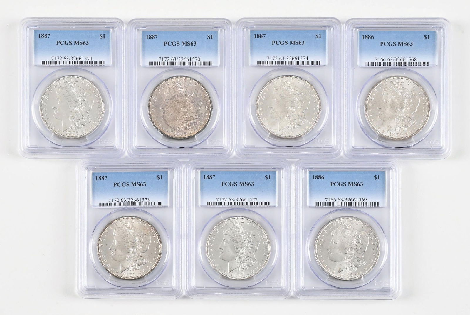 LOT OF 7: 1886-1887 $1 MS63 PCGS: LOT OF 7: 1886-1887 $1 MS63 PCGS