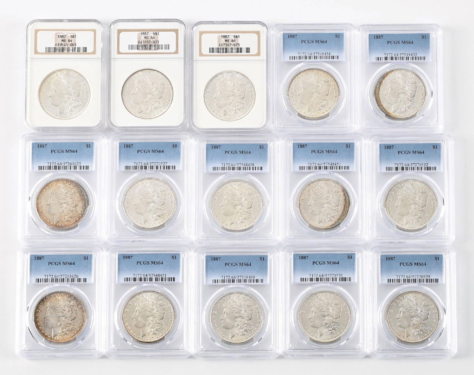 LOT OF 15: 1887 $1 MS64 PCGS & NGC.: Graded by PCGS and NGC.