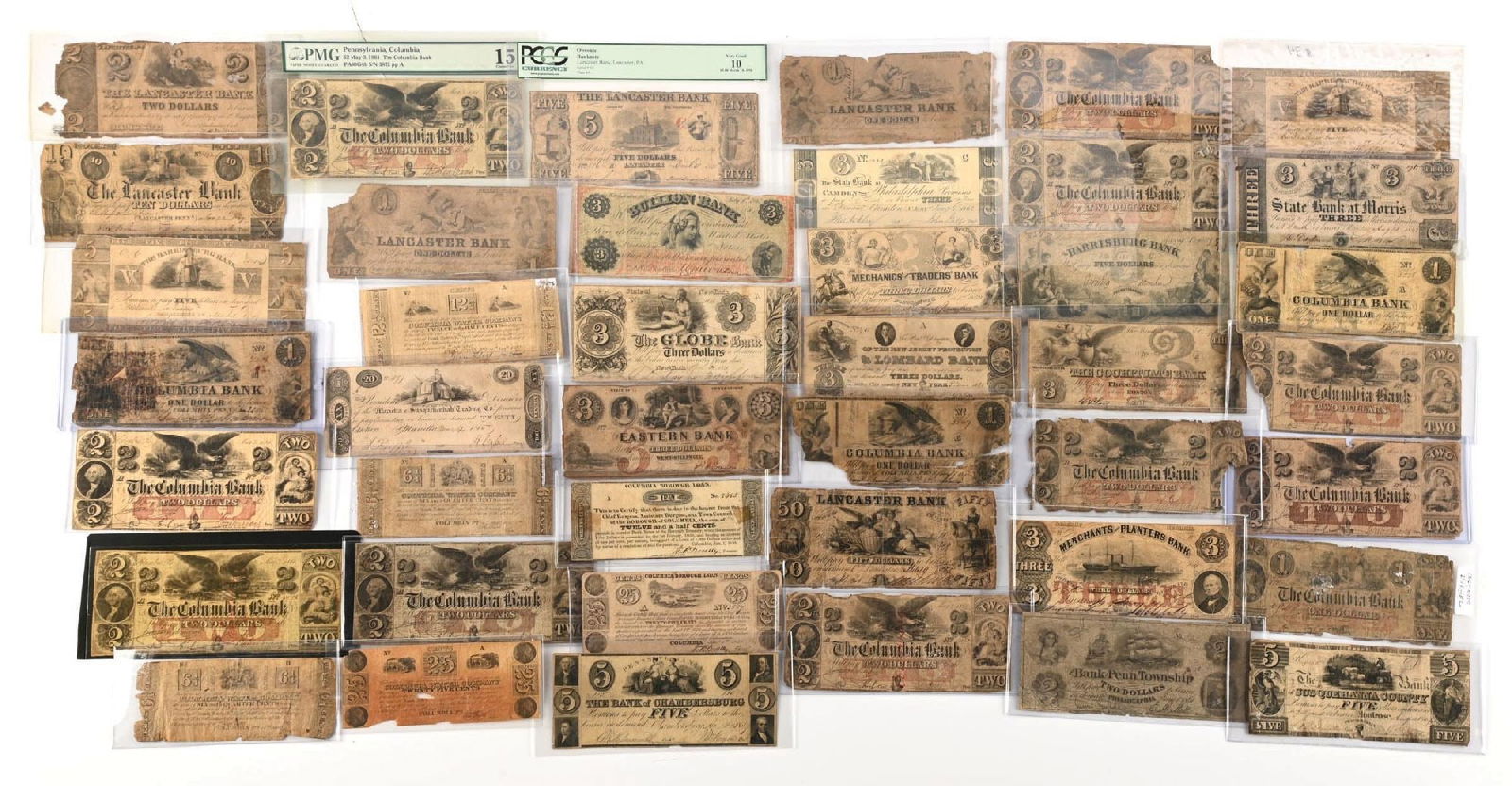 LARGE LOT OF 42 OBSOLETES: Nice assortment. Includes some graded notes. Many from Lancaster, PA.