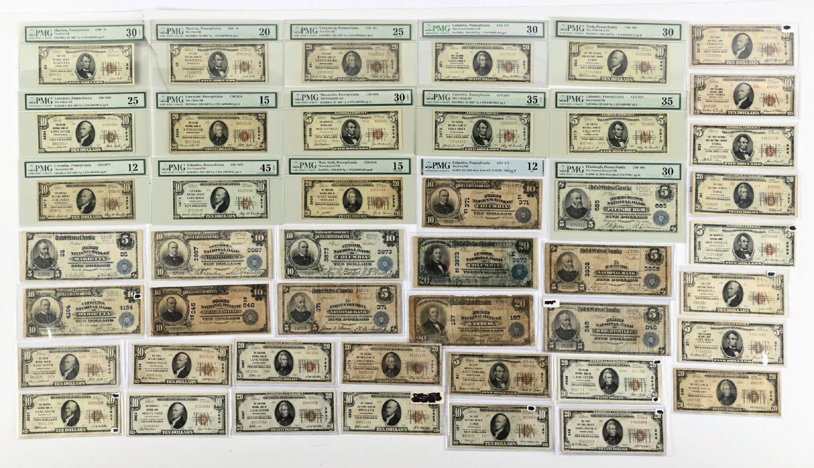 45 NATIONAL NOTES GRADED VG-XF: This offering features an interesting lot of 45 Pennsylvania National Bank Notes, a mix of Large Size and Small Size examples representing 15 different charter numbers and grading from Good to Very Fi