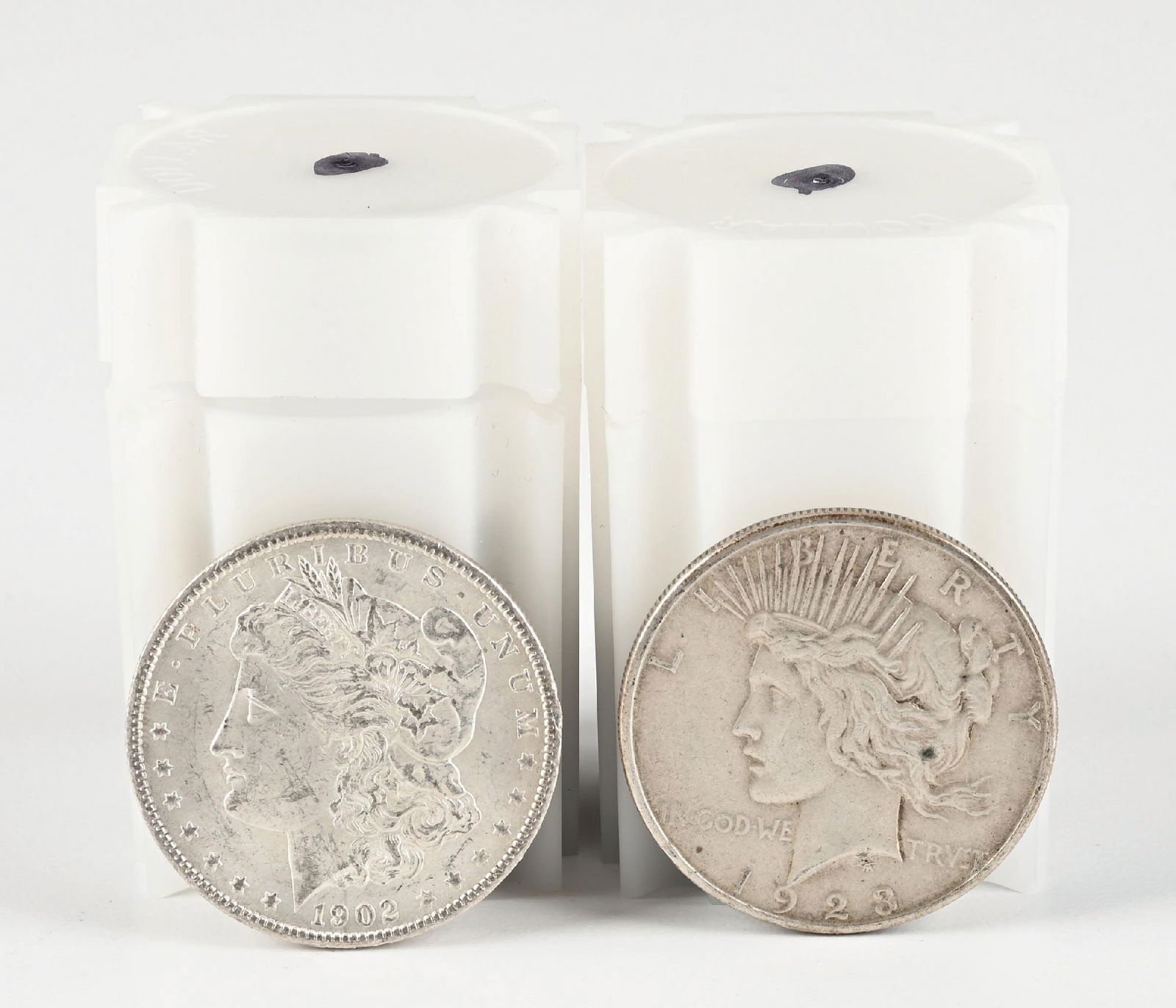 LOT OF 22 MIXED SILVER DOLLARS: 47.5 grams of .900 Gold. Dimensions: Each Tube: 2 - 1/2" x 1 - 1/2".