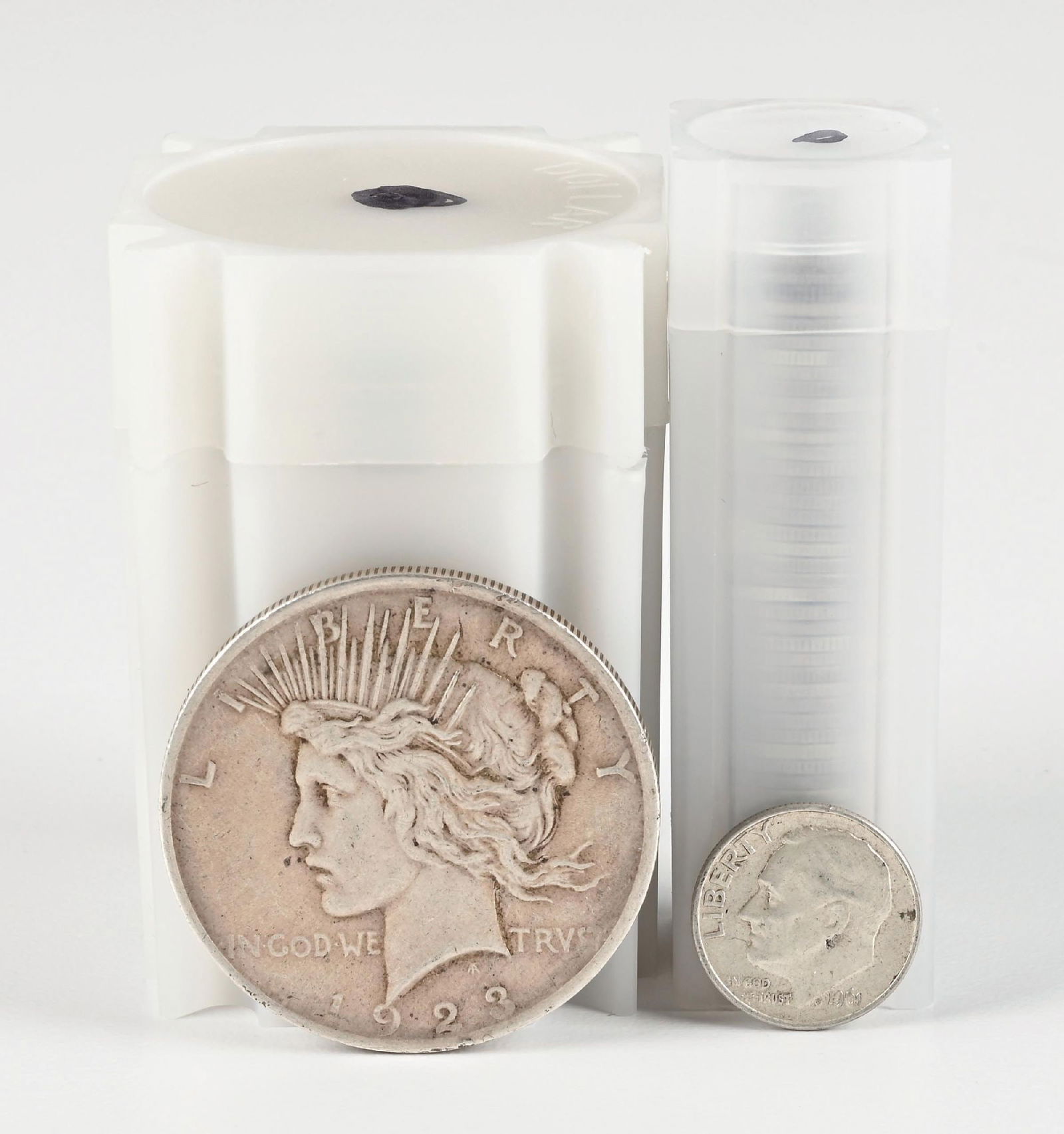 2 ROLLS OF SILVER COINS - 1 ROLL OF DIMES AND 1 ROLL OF PEACE DOLLARS: 2 ROLLS OF SILVER KENNEDY HALF DOLLARS Dimensions: Largest Tube: 2 - 1/2" x 1 - 5/8".
