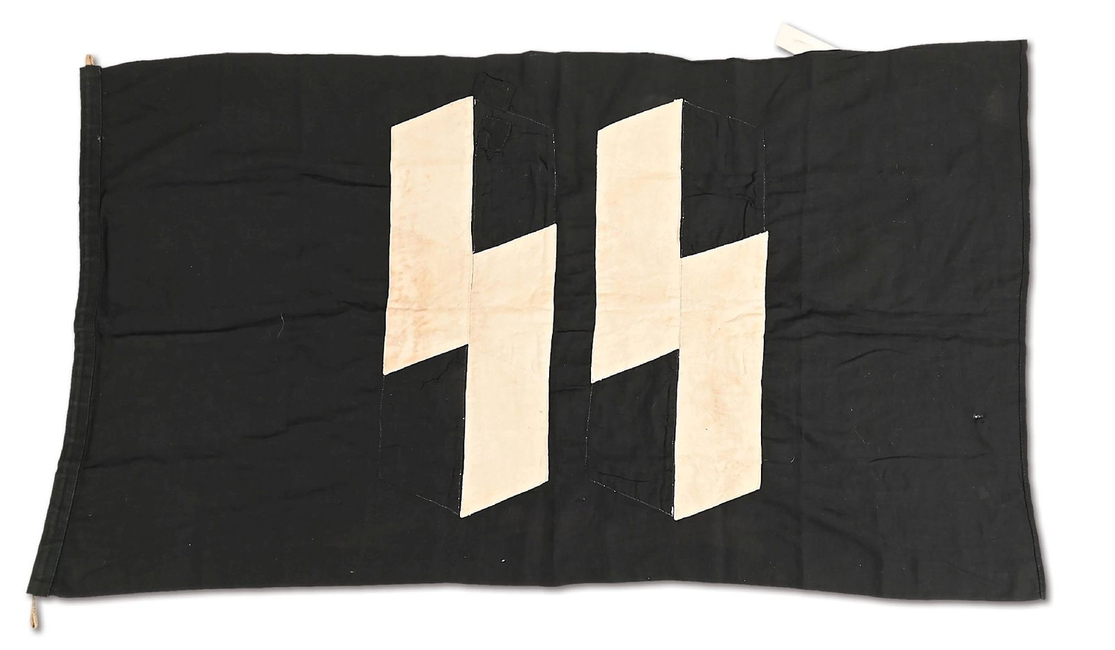 GERMAN WWII WAFFEN SS BARRACKS FLAG.: Waffen SS barracks measuring 28" by 44", double-sided, and with a attachment cord sewn into the side. Each half of the runes are machine-sewn individually to the cotton flag. There are 2 patched repai