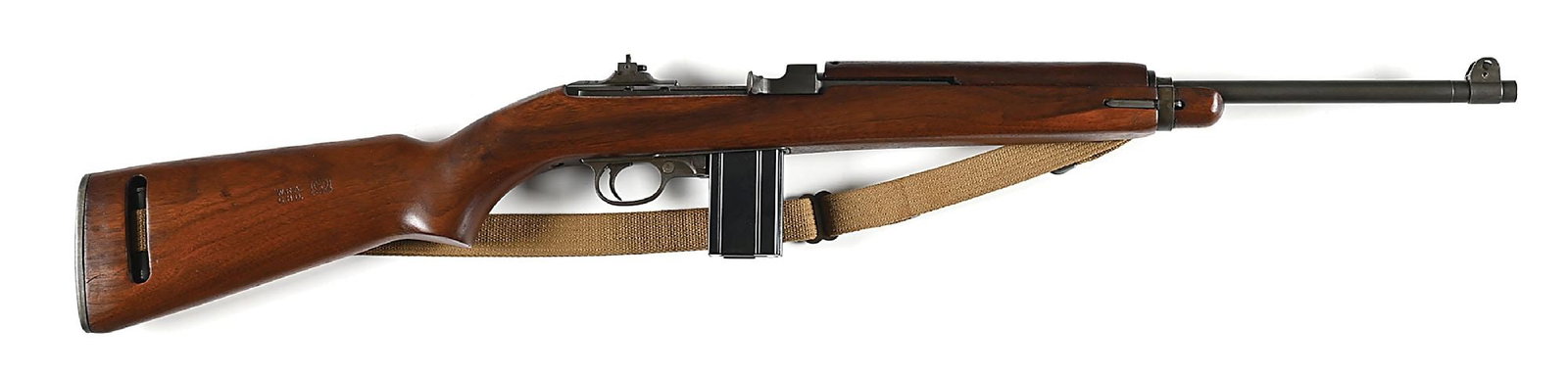 (C) OUTSTANDING WINCHESTER M1 SEMI-AUTOMATIC CARBINE.: Manufactured as part the first block of Winchester production which ran from October 1942 to December 1943. The parkerized barrel is struck with the characteristic "W" Winchester marking and encircled