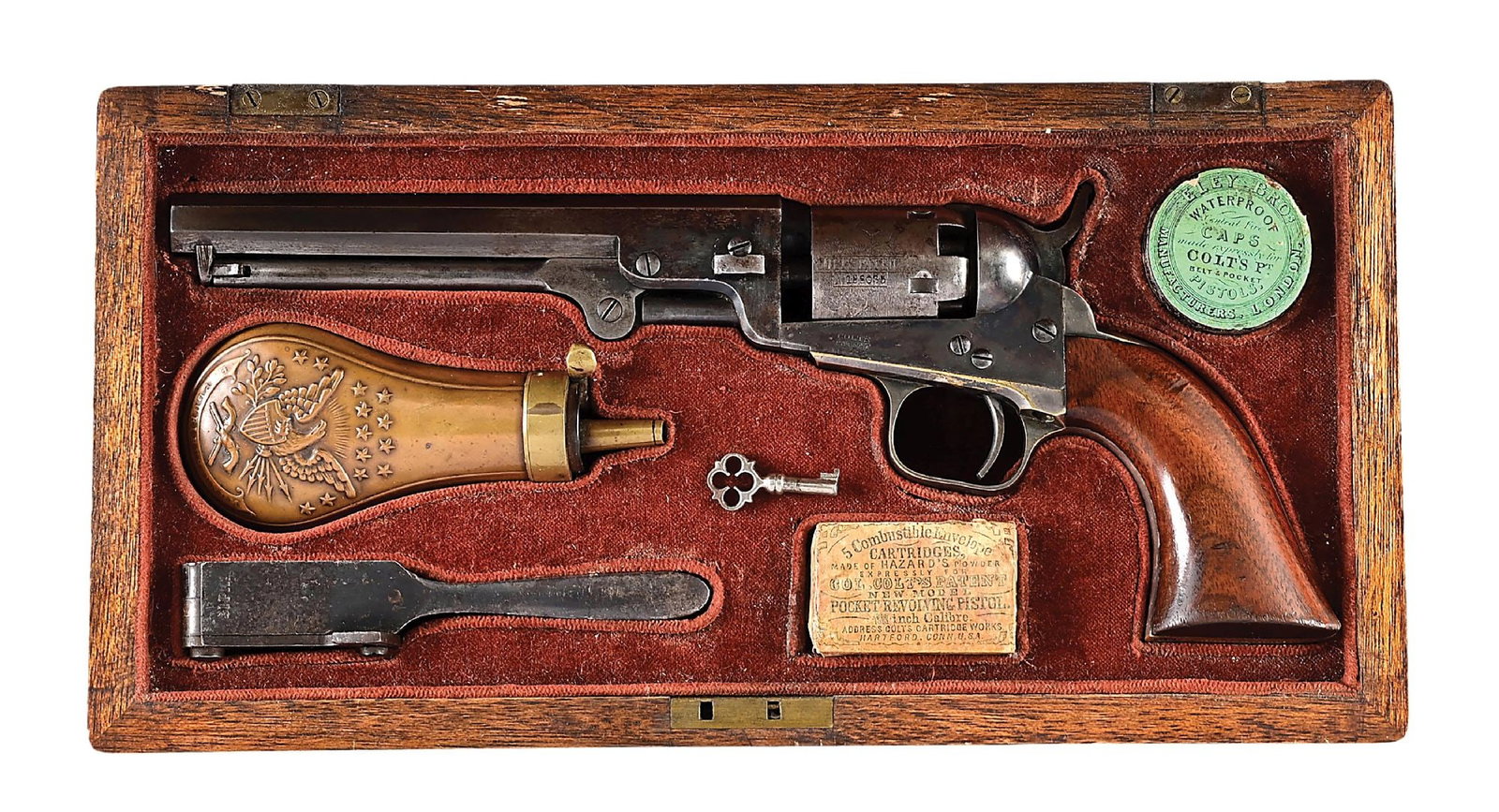 (A) FINE CASED COLT 1849 POCKET SINGLE ACTION PERCUSSION REVOLVER.: Dates to 1861. This is an early Hartford model and the Colt legend is stamped atop the barrel. Standard features with the desirable long barrel showing the standard blue and case color finish, octagon