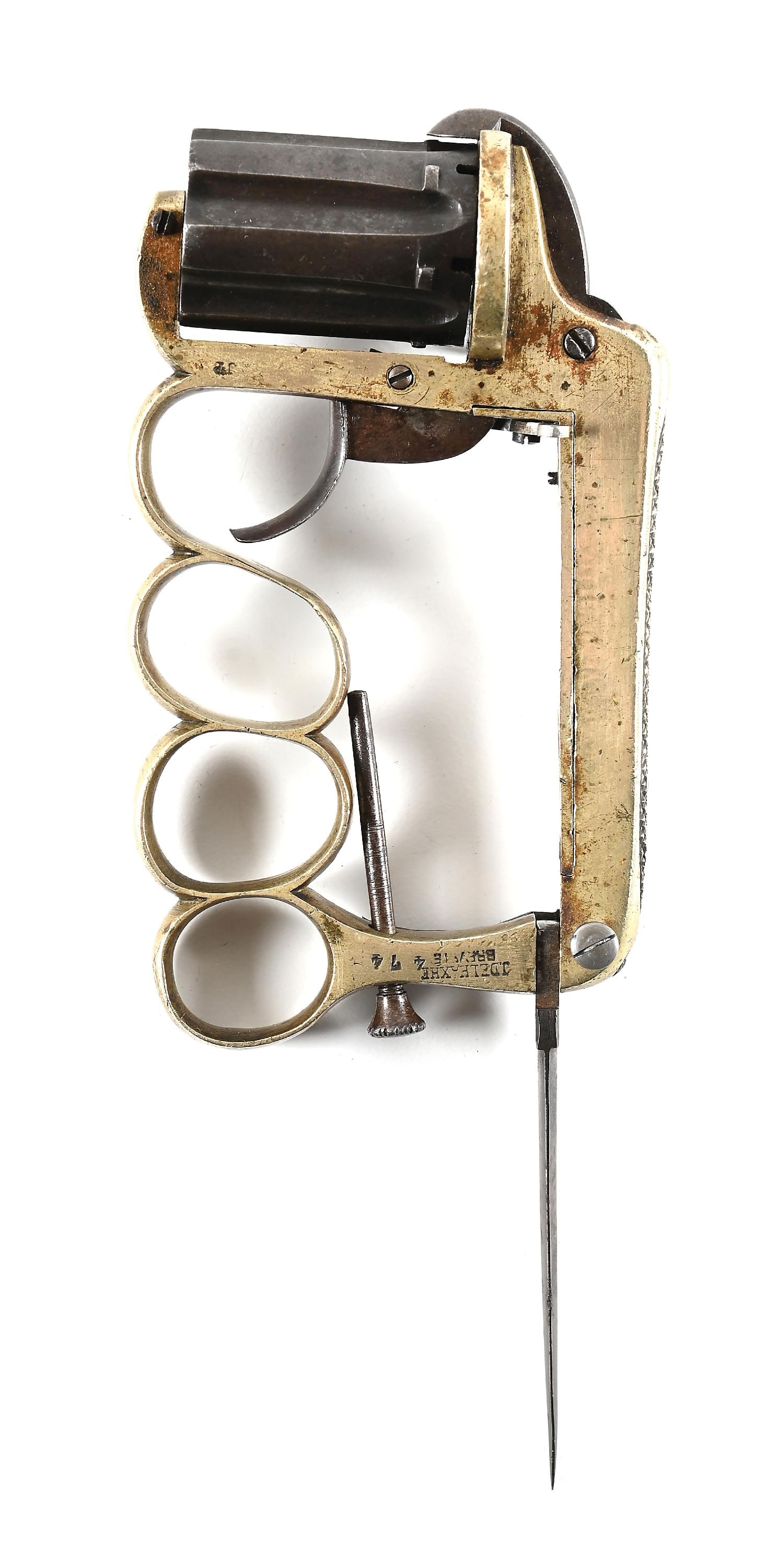 (A) J. DELEAXHE BREVETE APACHE KNUCKLEDUSTER PINFIRE REVOLVER WITH FOLDING SPEARPOINT FIGHTING: A highly unusual variant of the iconic and formidable Apache knuckleduster revolver patented by Joseph Deleaxhe in the early 1870s. The frame of this revolver is of German silver with an integral set