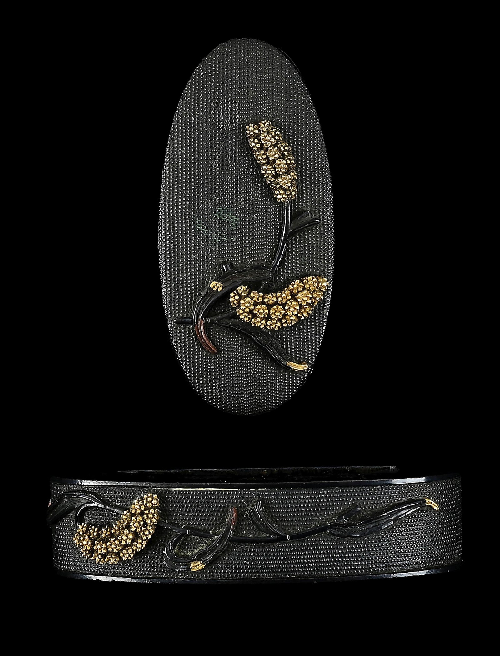 ARAKI TOMEI FUCHI KASHIRA WITH DESIGNS ON MILLET ON A NANAKO GROUND: Araki Tomei was a late Edo period (1817-1870) tosogu maker who worked in Kyoto. He apprenticed under the famous Goto Tojo, who reputedly gave him the "to" kanji in his name, and under Goto Ichijo, aft