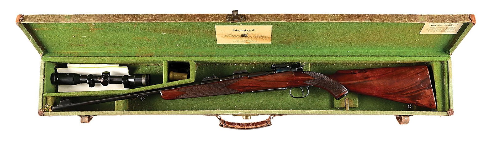 (C) RIGBY .275 RIGBY BOLT ACTION RIFLE WITH CASE.: Mauser serial number 1097, Rigby number 5543; "Original Mauser Oberndorf Sporting Rifles" by Jon Speed et al dates the receiver to 1899 and the sale of the rifle to circa 1930s; 5482 was recorded 1929